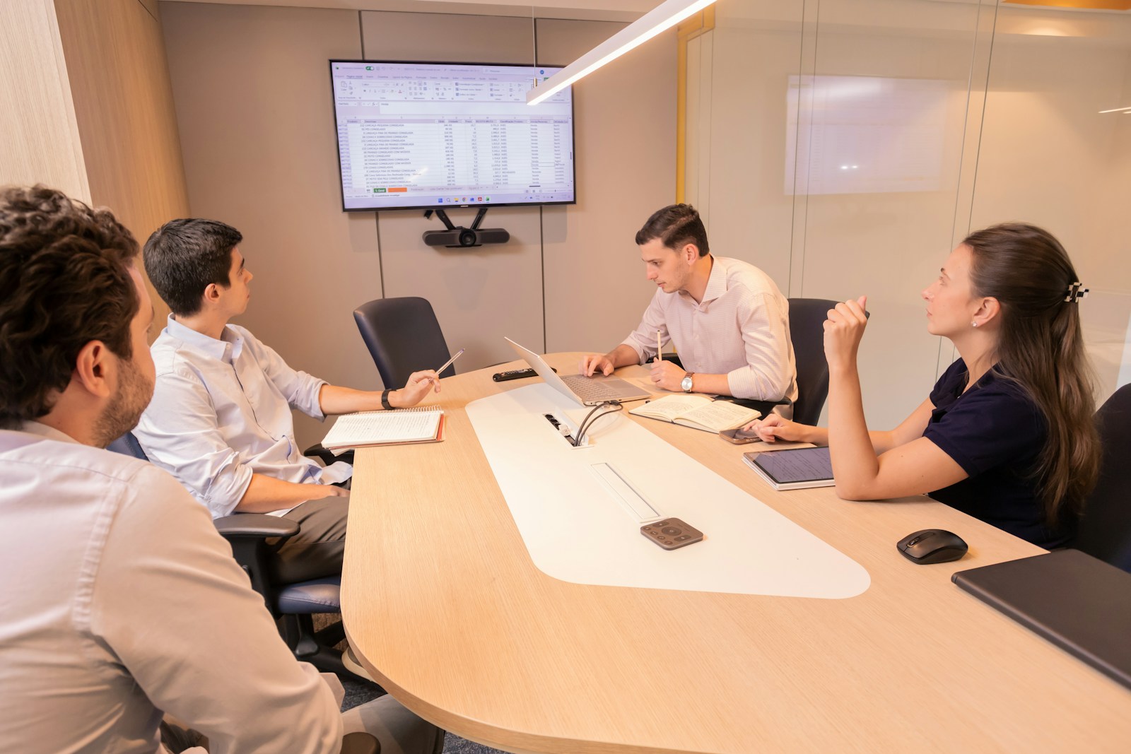 A leadership review around a conference table